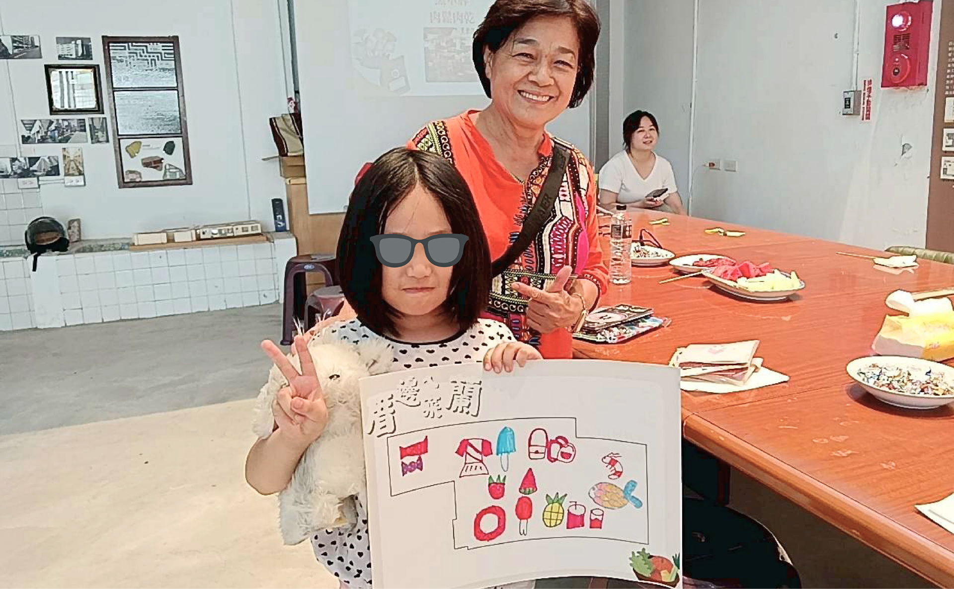 小朋友通過繪畫連結市場印象。